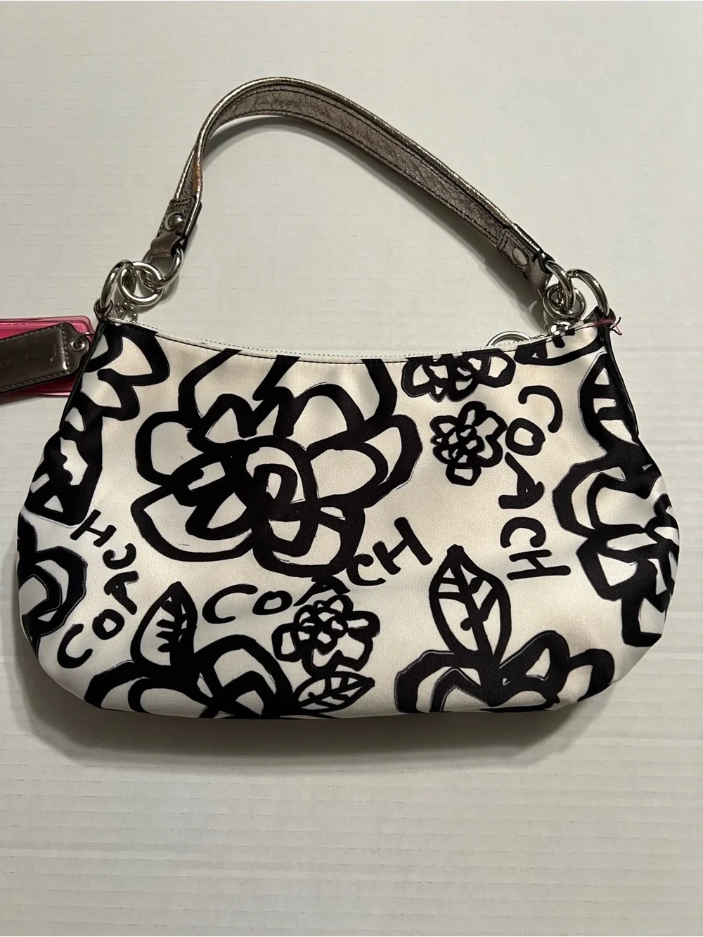 Coach Poppy small satin shoulder bag with pink accents and lining